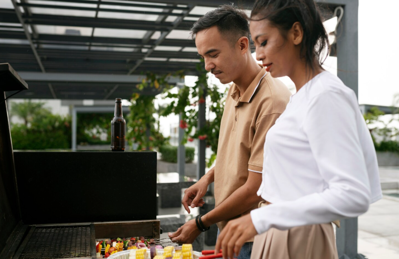 custom backyard deck with grilling station and outdoor cooking area for family entertaining