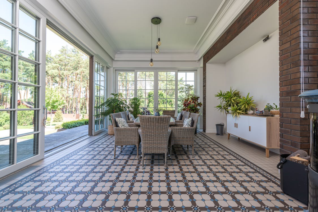 outdoor dining area with deck and covered patio for family gatherings