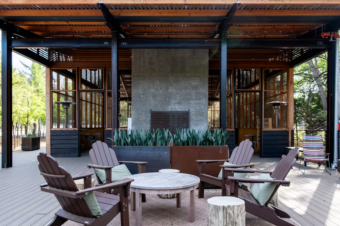 Covered patio with comfortable lounge seating providing shade from strong afternoon sunlight